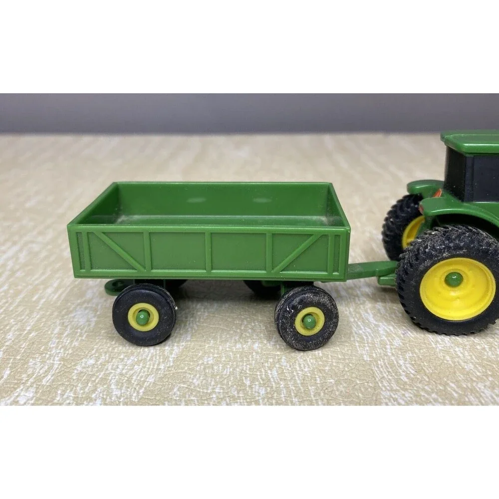 ERTL John Deere Tractor & Trailer and Stationary Plastic Tractor with 2 Rakes